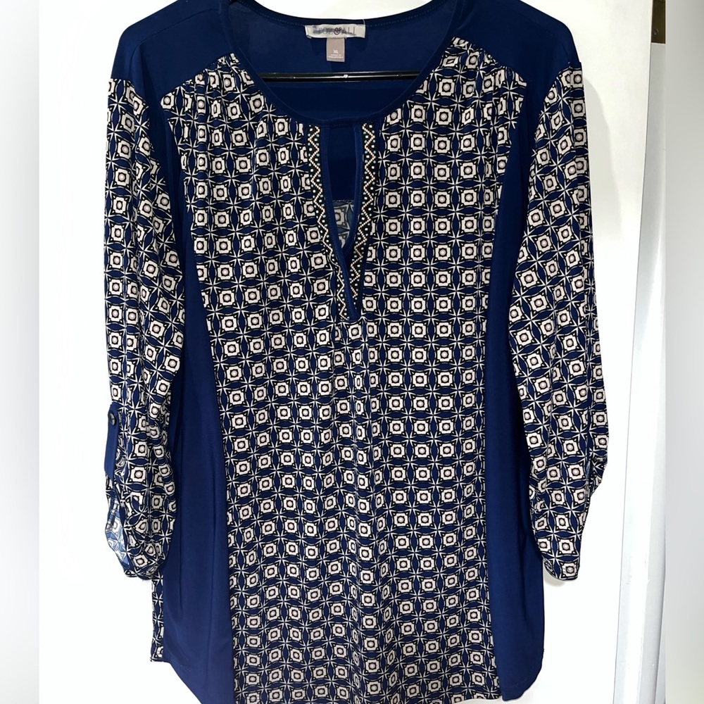 Women’s blouse. Very silky and light weight top